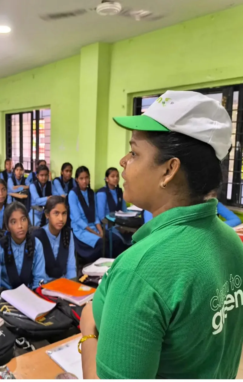 A C2G facilitator running a session with school students